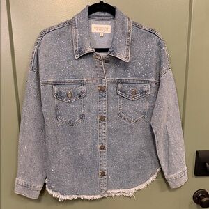 Veveret Light Blue Denim Jacket with Frayed Hem and Speckled Detail